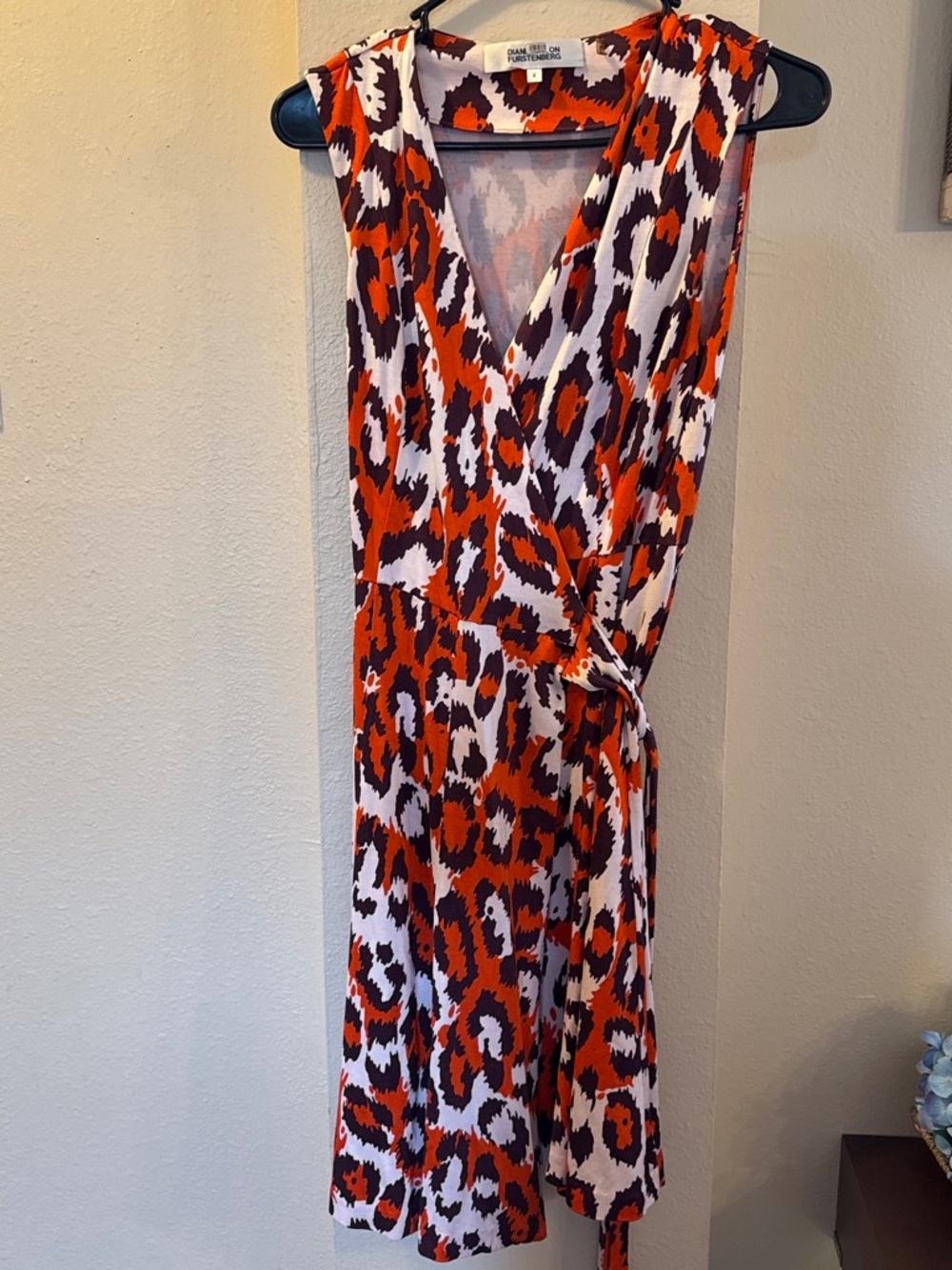 Orange and brown cheetah print wrap dress